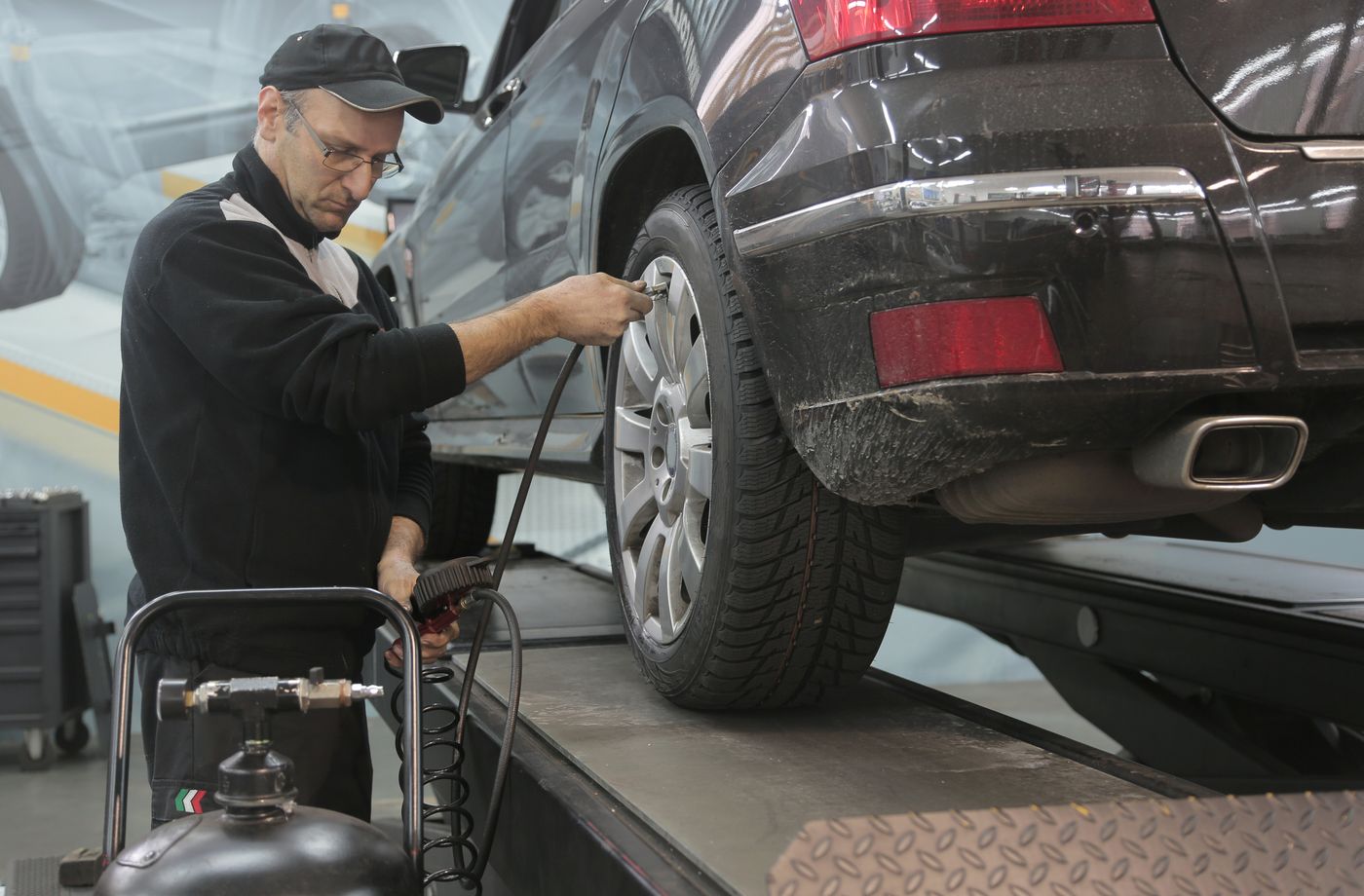 Mechanic checking a car engine
